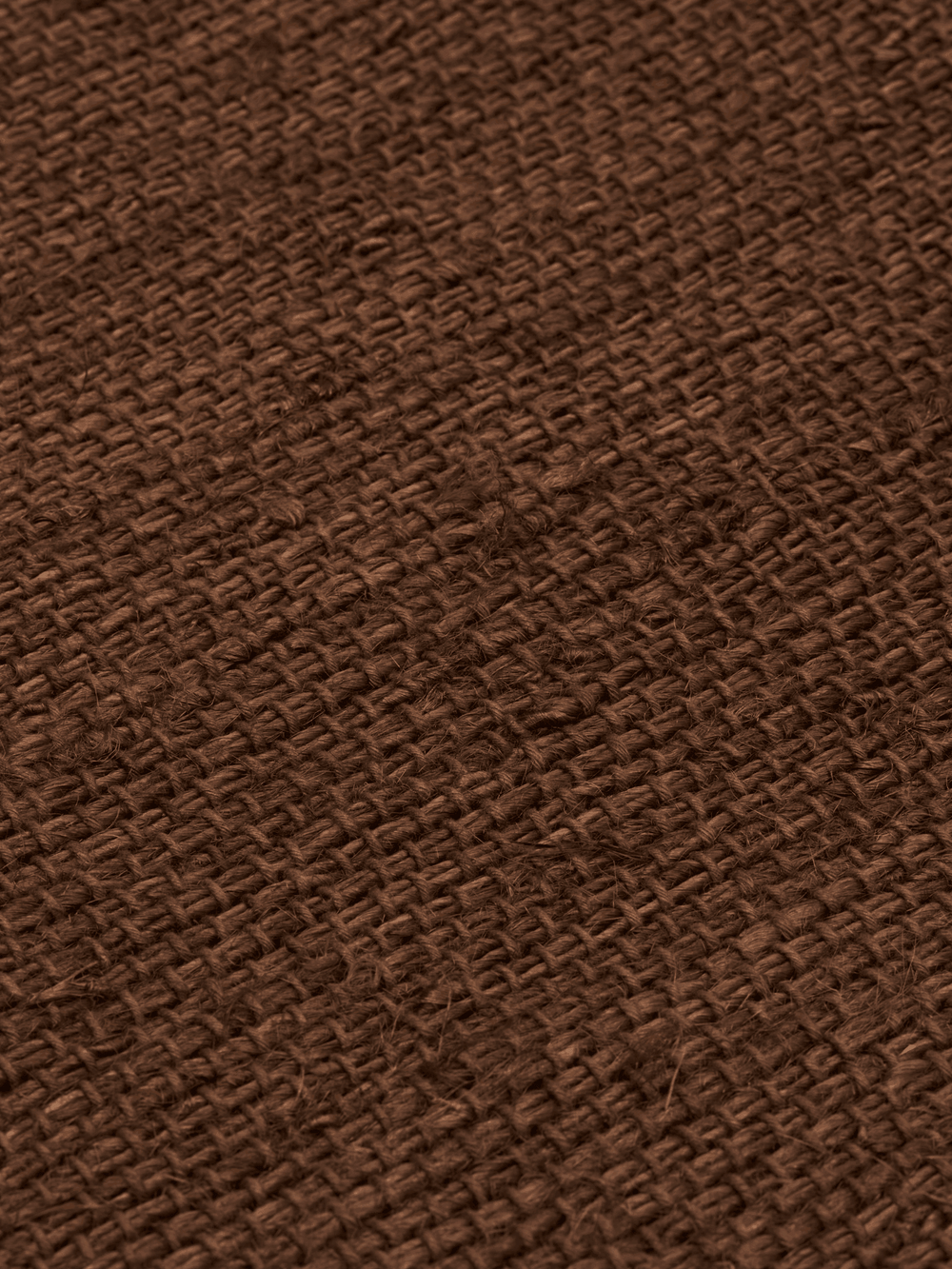 Close-up of the open weave in dark chocolate
