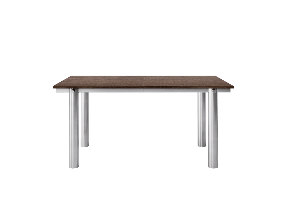 Dining table with dark stained oak top on brushed stainless steel cylindrical legs, side view