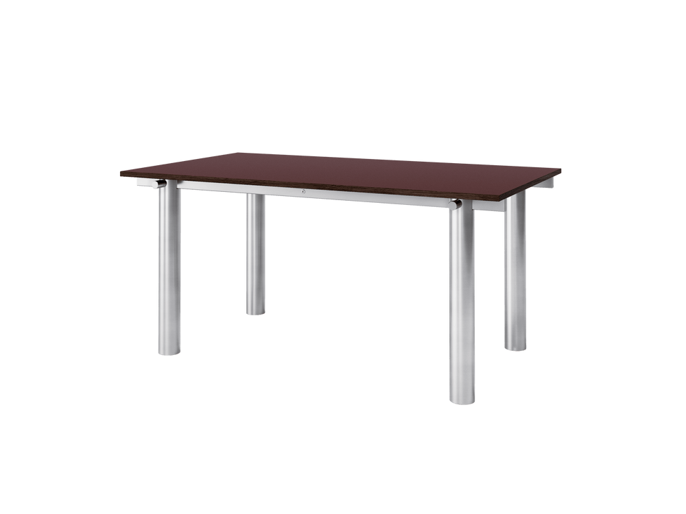 Rectangular dining table seen at an angle, burgundy linoleum top on cylindrical legs