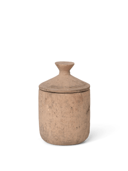 Ura Scented Candle in pale sienna, textured terracotta jar with a pointed lid